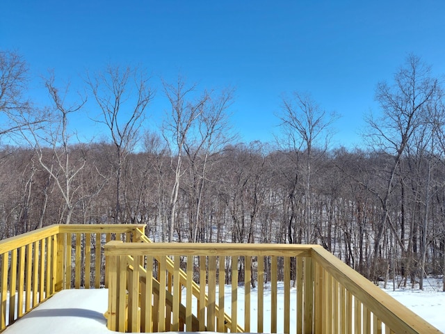 view of snow covered deck