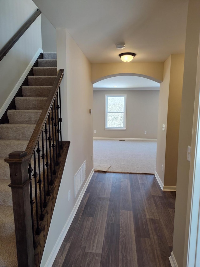 corridor with dark wood-type flooring