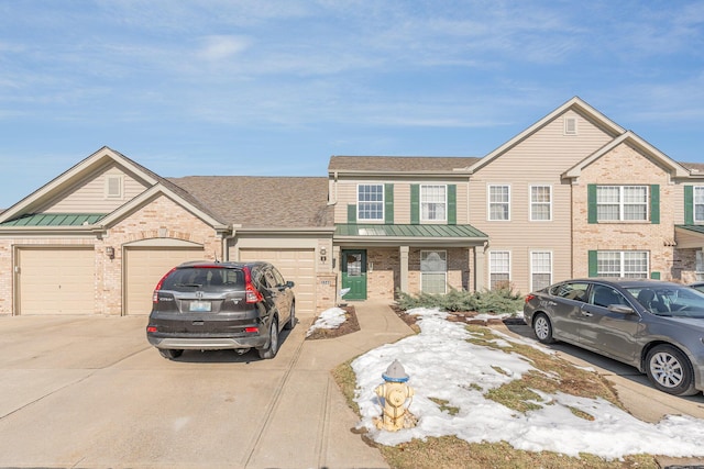 view of front of house featuring a garage and covered porch