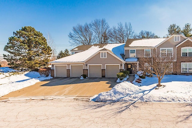 view of front of property featuring a garage