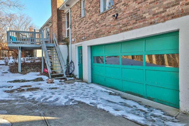 view of snow covered garage