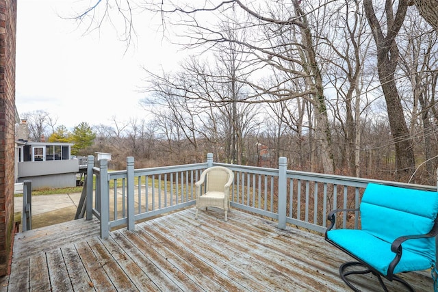 deck with a sunroom