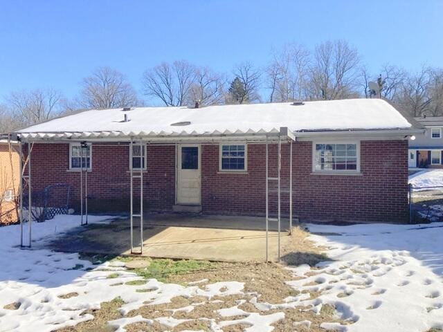 view of snow covered property