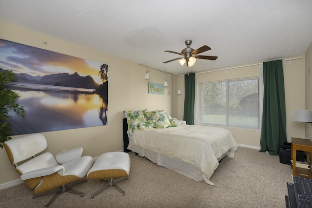 bedroom with light colored carpet and ceiling fan