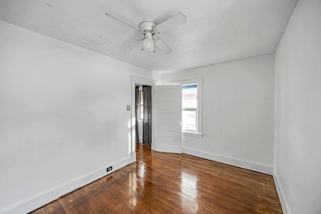 unfurnished room with hardwood / wood-style floors and ceiling fan