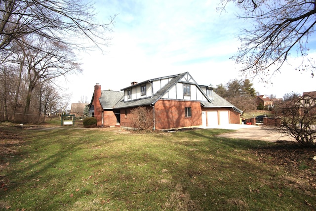 view of property exterior with a garage and a lawn