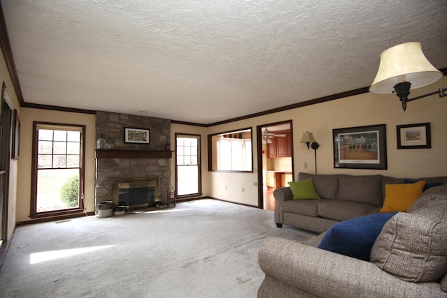 living room featuring crown molding, a stone fireplace, carpet, and a textured ceiling