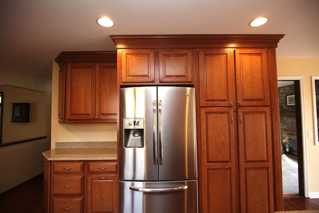 kitchen with stainless steel fridge with ice dispenser