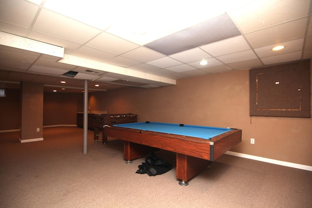 game room featuring a drop ceiling, electric panel, and carpet flooring