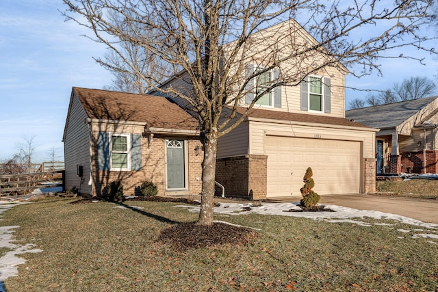 view of front of house featuring a garage and a front lawn