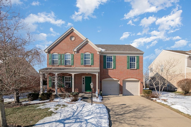 view of front of house featuring a garage and a porch