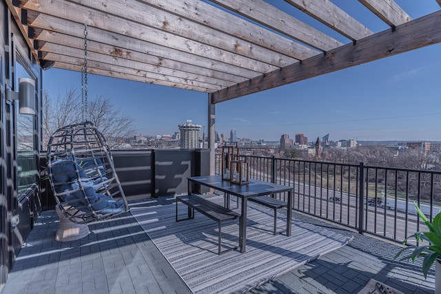 wooden terrace with a pergola