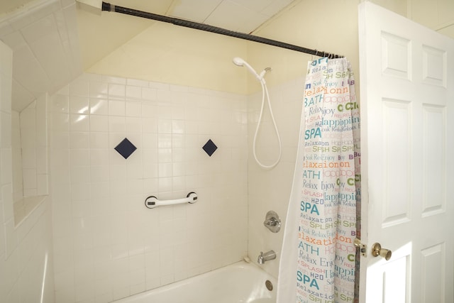 bathroom featuring shower / bath combination with curtain