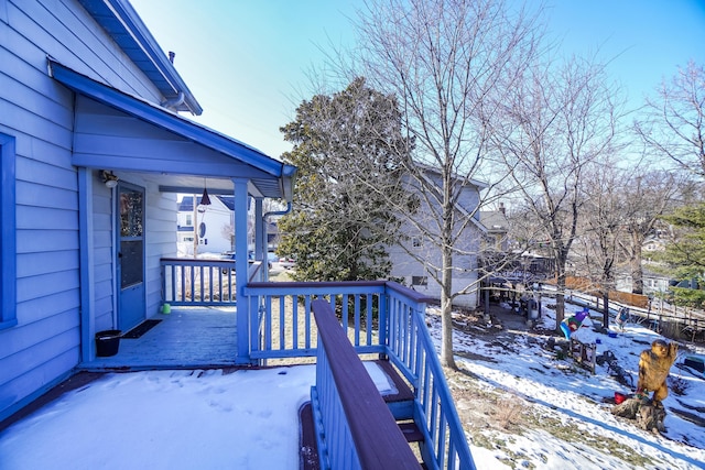 view of snow covered deck