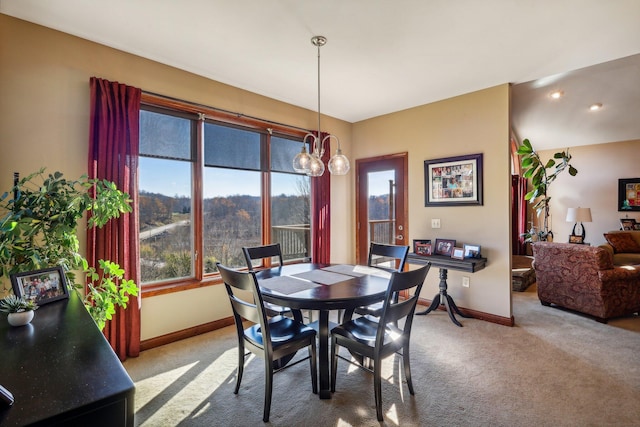 dining area featuring carpet flooring