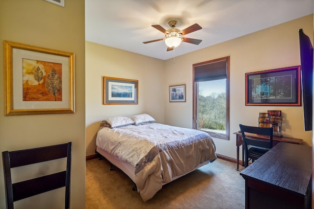 bedroom with ceiling fan and light colored carpet