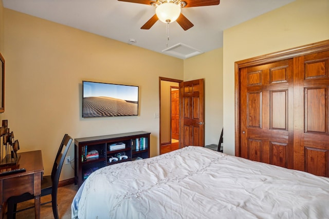 carpeted bedroom featuring a closet and ceiling fan