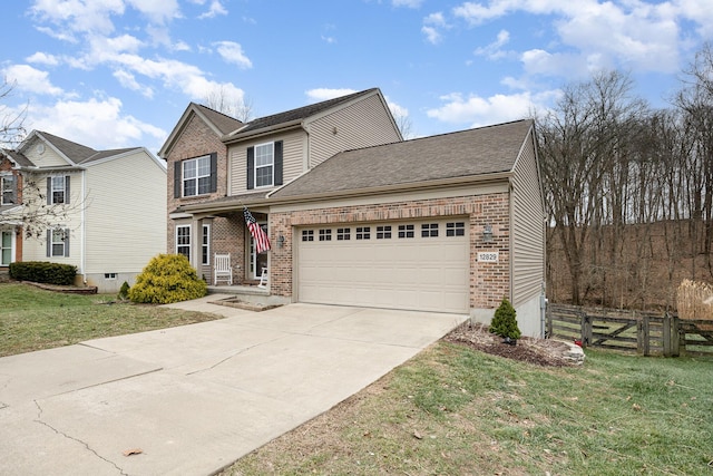 view of front facade with a garage and a front lawn