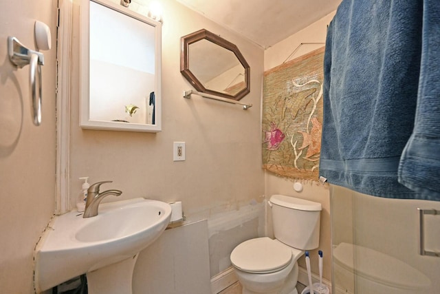 bathroom with sink and toilet