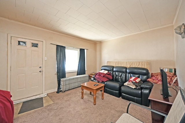 living room featuring light colored carpet, radiator heating unit, and ornamental molding