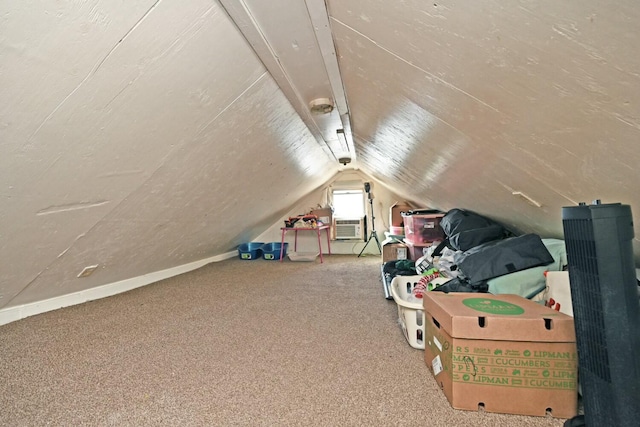 bonus room with vaulted ceiling, carpet, and cooling unit