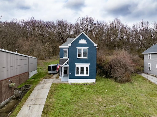 view of outdoor structure featuring a lawn