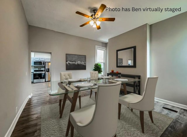 dining space with wood-type flooring and ceiling fan