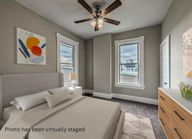 carpeted bedroom with ceiling fan