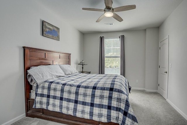 carpeted bedroom featuring ceiling fan