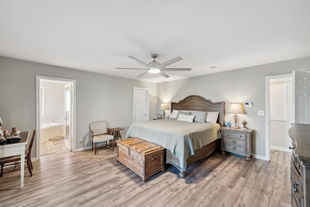 15027 Madison Pike, Morning View, KY 41063 - bedroom featuring light wood-type flooring, baseboards, connected bathroom, a closet, and a ceiling fan