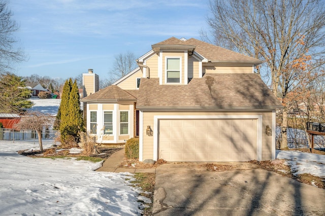 view of property with a garage