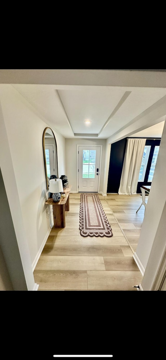 doorway to outside featuring hardwood / wood-style flooring