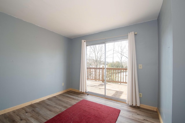 spare room featuring light wood-type flooring