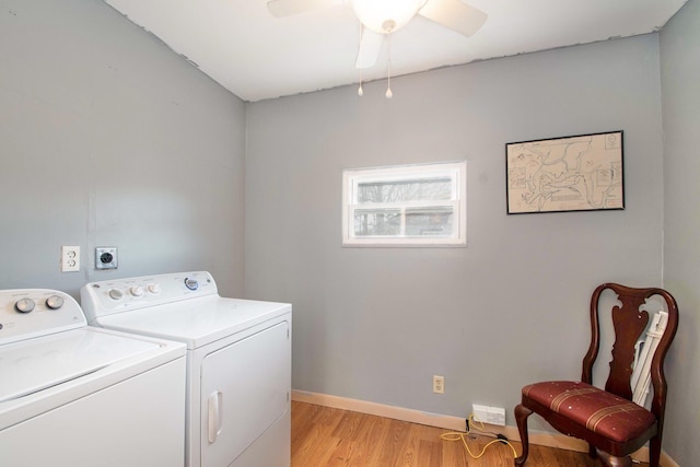 washroom featuring ceiling fan, independent washer and dryer, and light hardwood / wood-style flooring