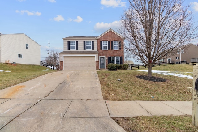 view of front facade with a garage and a front lawn