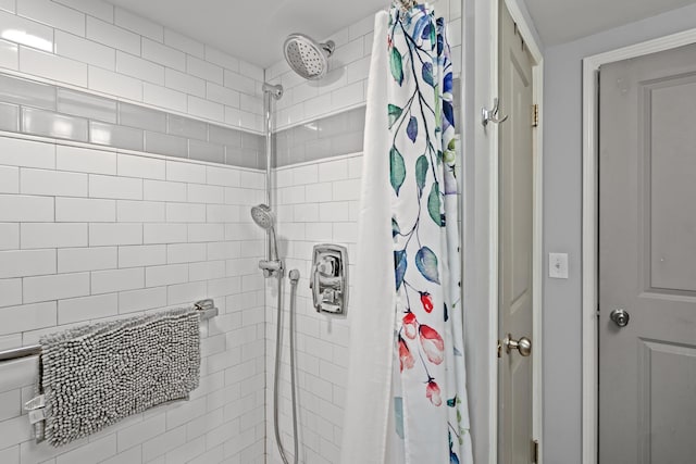 bathroom with curtained shower