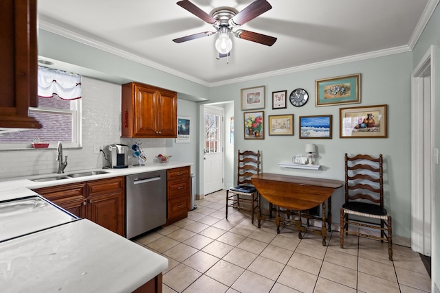 kitchen with sink, crown molding, light tile patterned floors, stainless steel dishwasher, and decorative backsplash