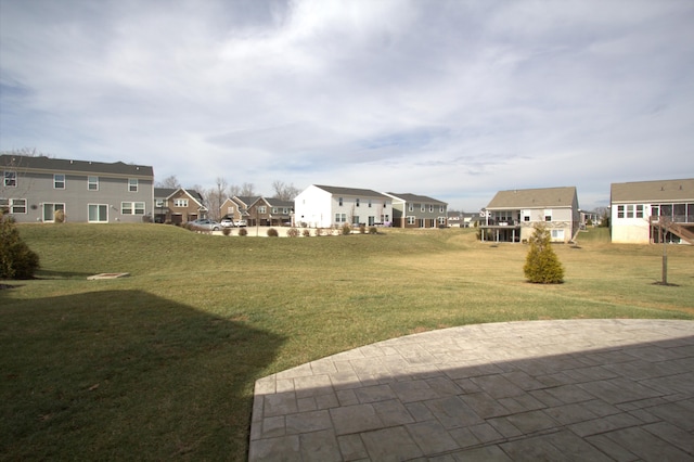 view of yard featuring a residential view