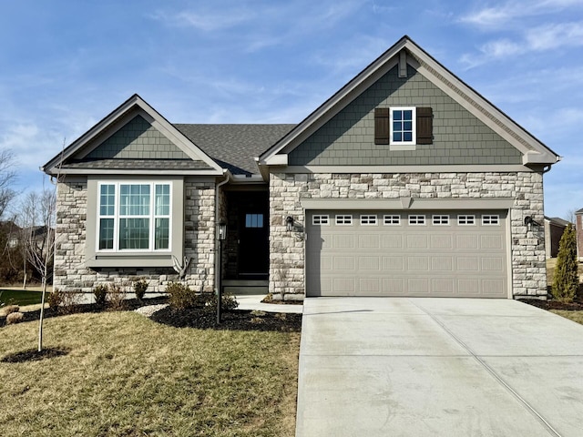 view of front of property with a garage and a front yard