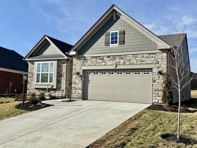 craftsman-style house with a garage and a front yard