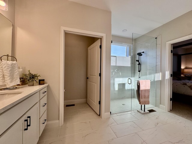 1516 Brumfield Ct, Union, KY 41091 - full bath with a stall shower, marble finish floors, ensuite bathroom, vanity, and baseboards