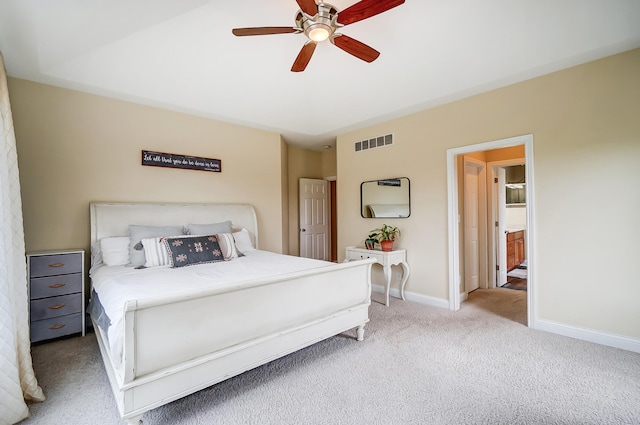 bedroom featuring ceiling fan and light carpet