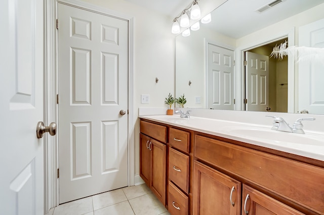 bathroom featuring vanity and tile patterned floors