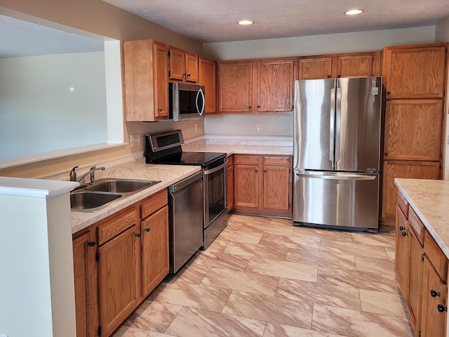 kitchen featuring stainless steel appliances and sink