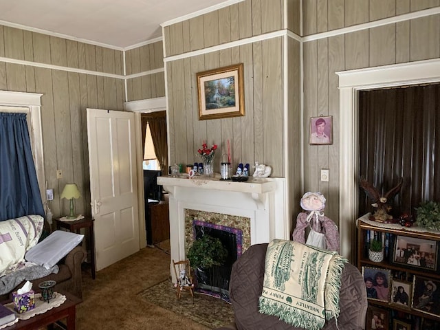 336 Roland Ave, Owenton, KY 40359 - living room with wood walls, a fireplace, ornamental molding, and carpet flooring
