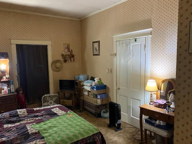 336 Roland Ave, Owenton, KY 40359 - bedroom featuring ornamental molding, carpet flooring, and wallpapered walls