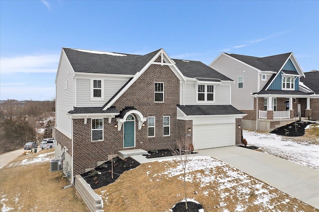 view of front facade featuring a garage, central AC unit, concrete driveway, roof with shingles, and brick siding