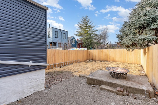 view of yard featuring a fire pit