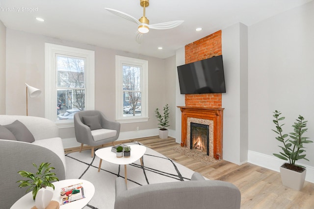 living room with light hardwood / wood-style flooring