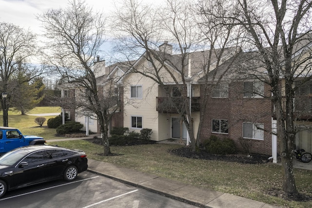 exterior space featuring a front lawn